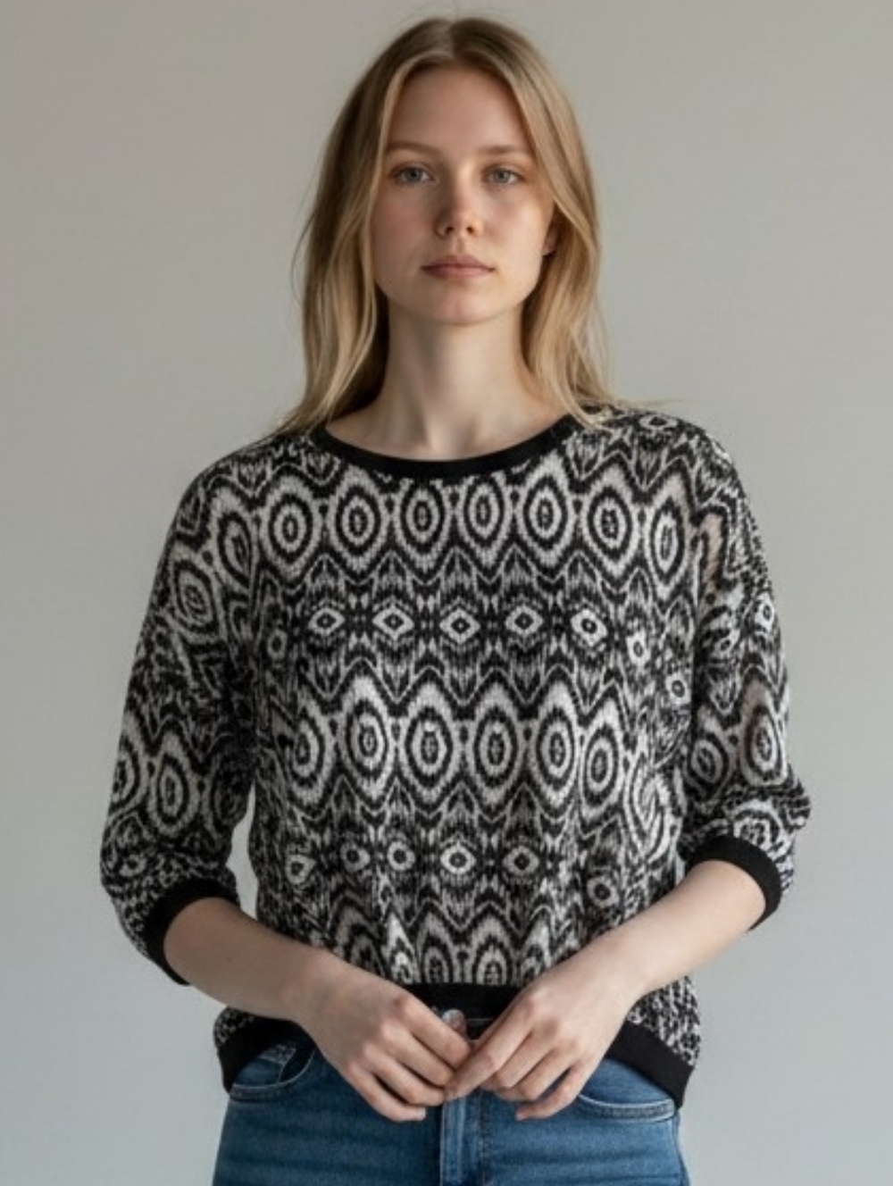 Black & White Geometric Knit Blouse with Ribbed Trim